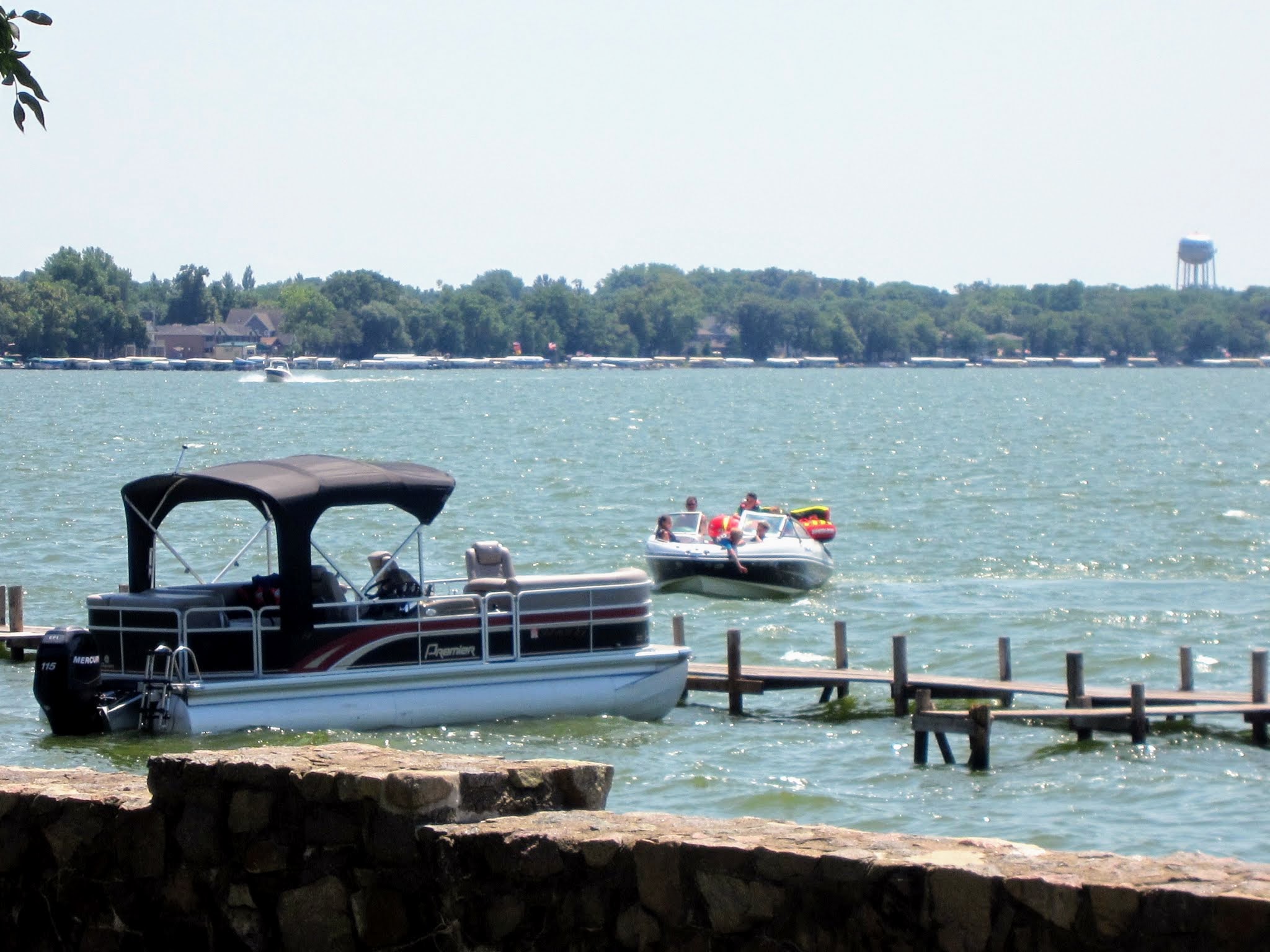 Boats on Clear Lake with South Shore homes in the background